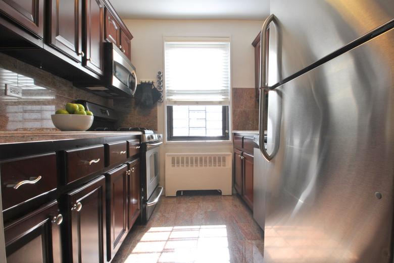 Kitchen with granite counters and stainless steel appliances