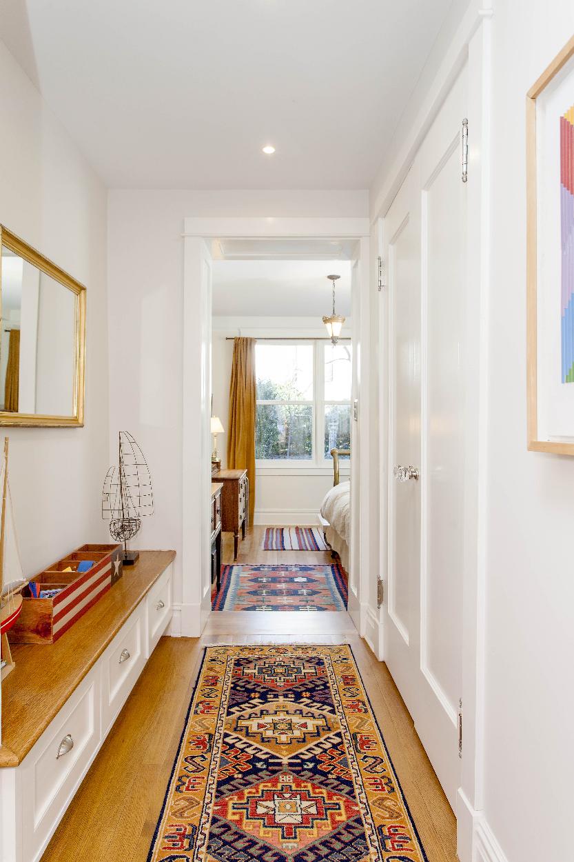 Child's Bedroom, 2 of 3 on Garden level, facing garden. View from dressing area w/ custom built-ins