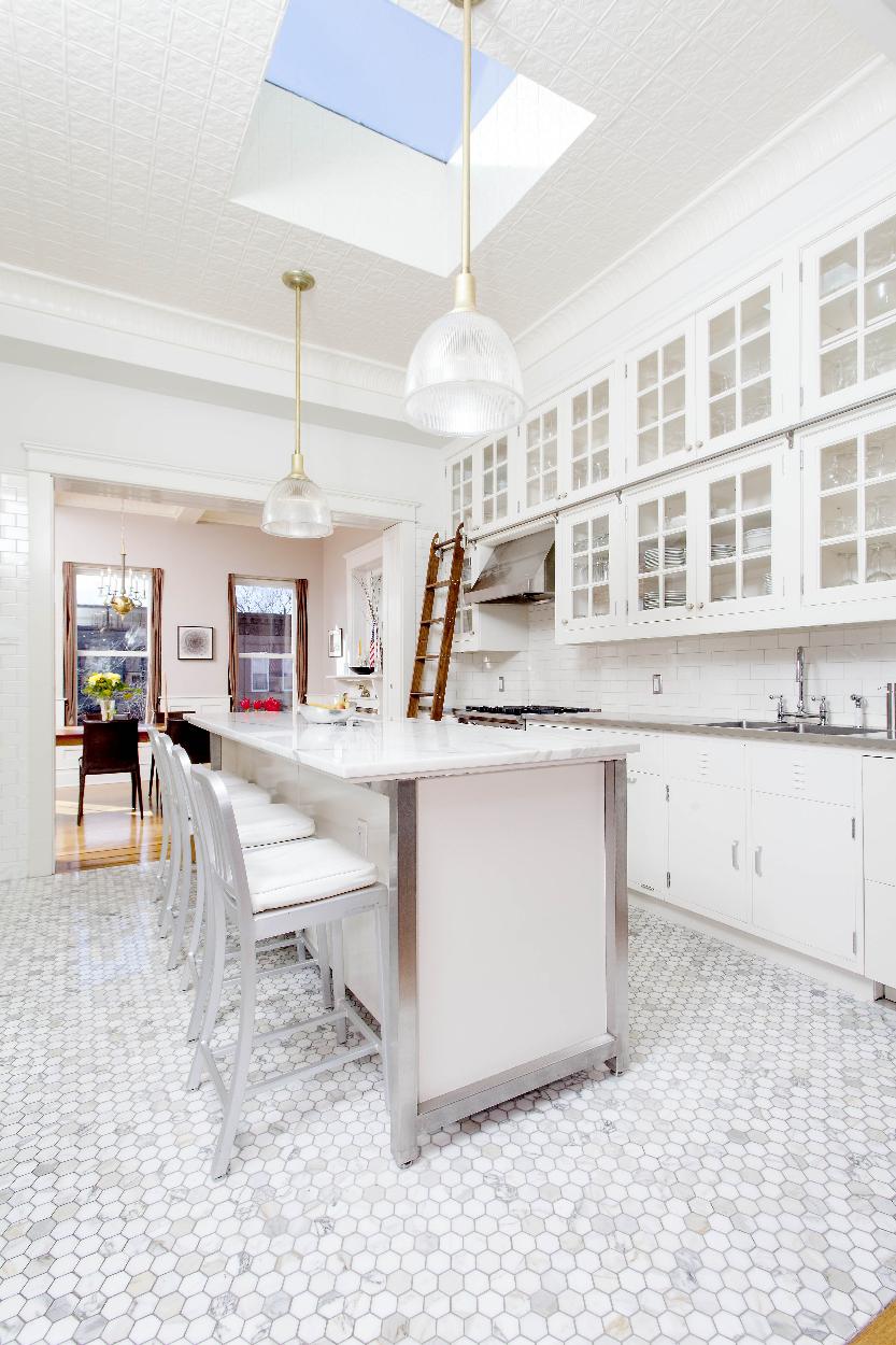 Kitchen: Wolf range, pro vented hood, dbl stainless sink, double dishwasher drawers, library ladder