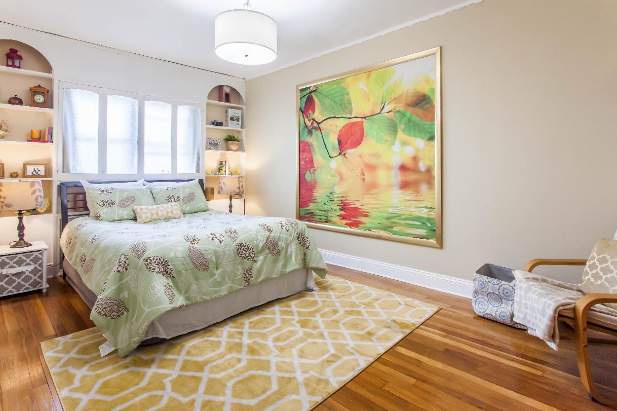 Third Floor: Spacious bedroom 2 with large windows, hardwood