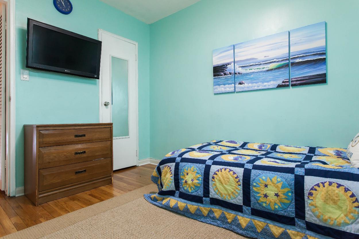 Third Floor: Bedroom 3 hardwood floors and natural light