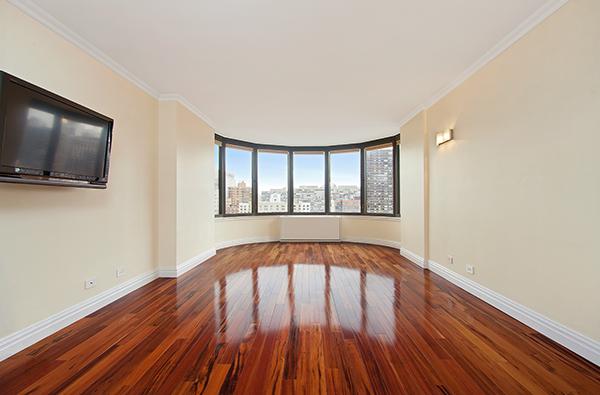 Wall mounted high-def TV, Brazilian wood floors, wall sconces on dimmers. Crown and base molding.